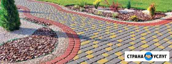 Укладка тротуарной плитки с помощью трамбовки Ростов-на-Дону