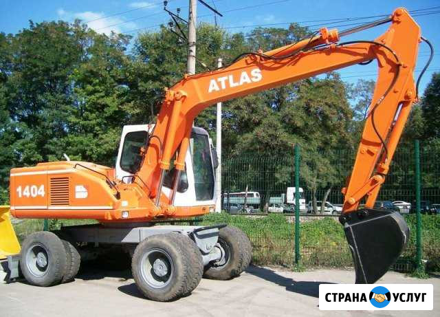 Услуги экскаватора Атлас 1304 Гвардейск - изображение 1