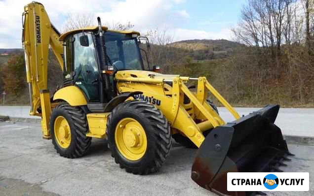 Аренда и услуги экскаватора погрузчика Октябрьский - изображение 1