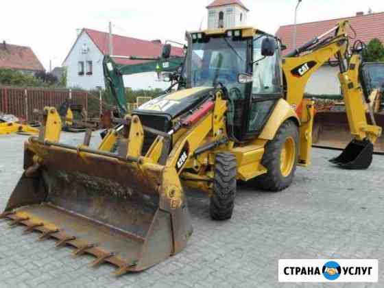 Аренда Экскаватор-погрузчика JCB CAT Москва