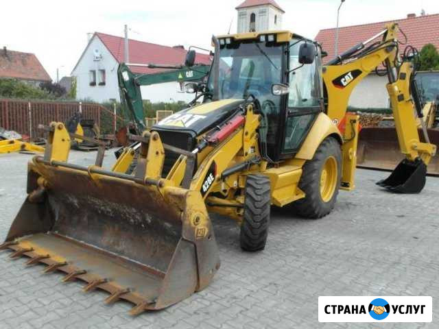 Аренда Экскаватор-погрузчика JCB CAT Москва - изображение 1