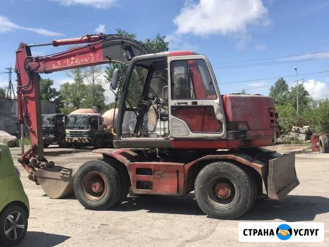 Услуги экскаватора (колёсник) ковш 0.5м3 Хабаровск - изображение 1