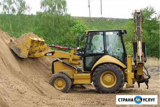 Услуга экскаватор-погрузчик CAT Новосибирск