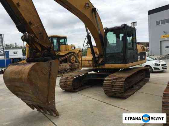 Аренда катка, экскаватора, бульдозера caterpillar Сургут