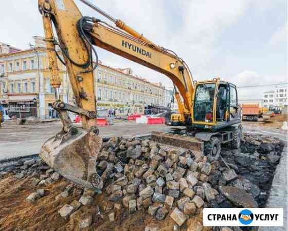 Колесный экскаватор в аренду Москва