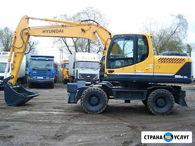 Аренда колесного экскаватора CAT (ковш/гидромолот) Ростов-на-Дону - изображение 1