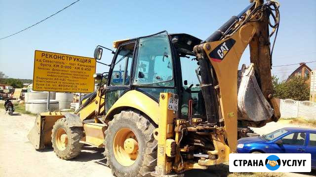 Экскаватор-погрузчик CAT 432E аренда (оператор) Севастополь - изображение 1