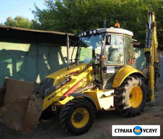 Аренда экскаватора-погрузчика New Holland B110 Сочи