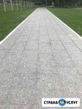 Укладка тротуарной плитки и брусчатки Москва