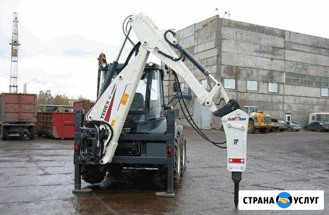 Аренда экскаватора погрузчика с гидромолотом Санкт-Петербург - изображение 1