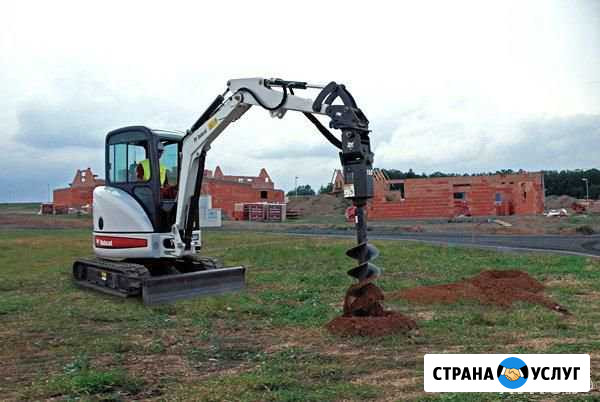 Услуги мини экскаватора с ямобуром Тюмень - изображение 1