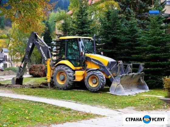 Аренда экскаватор-погрузчика Санкт-Петербург