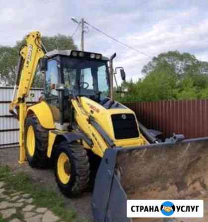 Экскаватор-погрузчик аренда услуги Тула