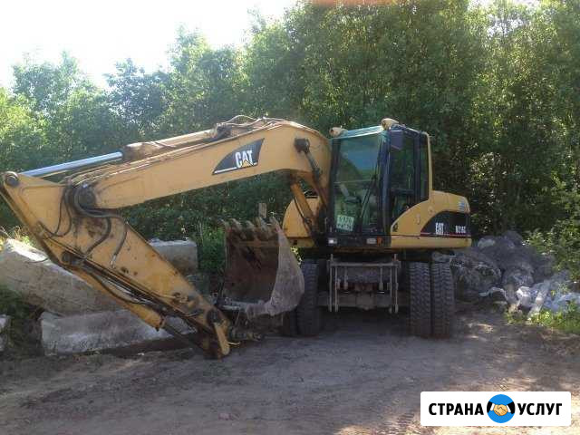 Аренда колесного экскаватора Санкт-Петербург - изображение 1