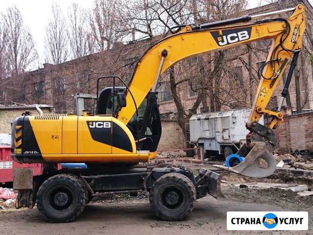 Аренда колесного экскаватора Москва - изображение 1