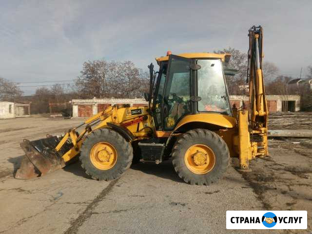 Аренда, услуги экскаватора-погрузчика JCB Симферополь - изображение 1