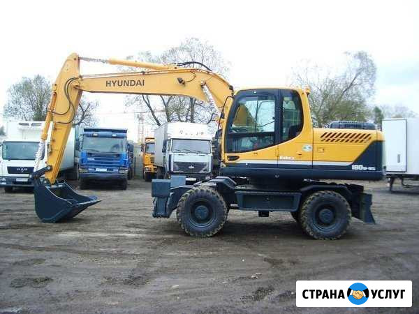 Аренда колесного экскаватора Пушкино - изображение 1