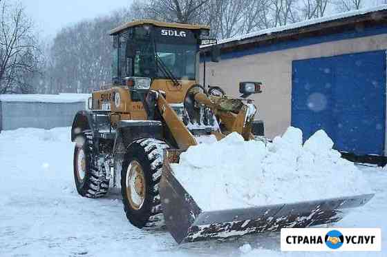 Уборка чистка вывоз снега. Фронтальный погрузчик Новосибирск