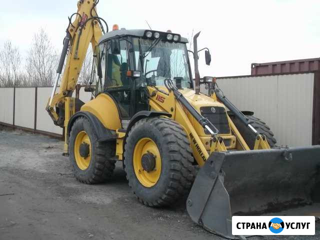 Услуги экскаватора погрузчика Нижневартовск - изображение 1