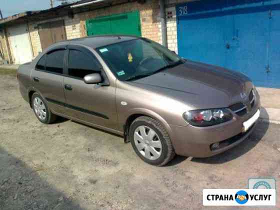 Аренда, прокат Nissan almera, Tiida Latio, Sunny Красноярск