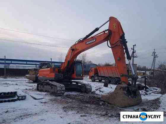 Услуги экскаватора погрузчика Тобольск