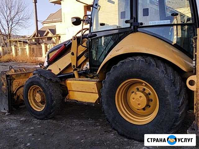Услуги эксковатора-погрузчика Черкесск - изображение 1