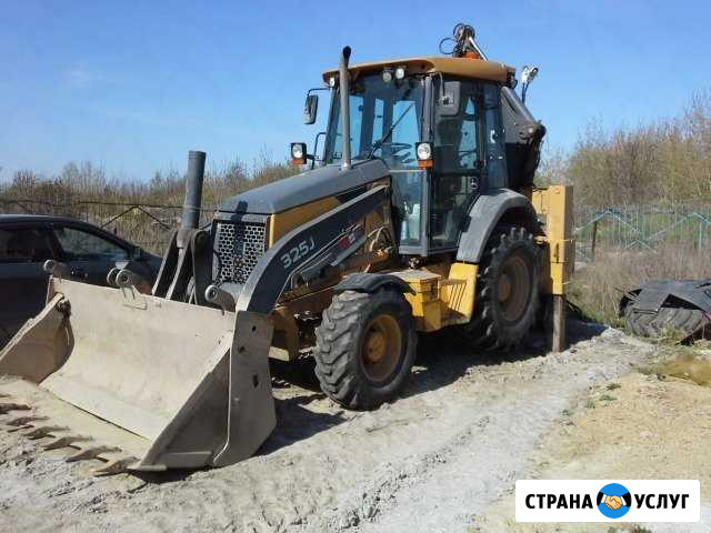 Экскаватор-погрузчик в аренду Уфа - изображение 1