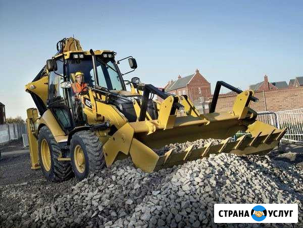 Услуги экскаватора погрузчика CAT428F, ямобура Екатеринбург - изображение 1