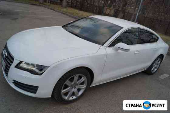 Аренда, прокат автомобиля ауди а7 Audi A7 с водите Самара