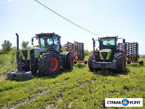 Дискация земли тракторами Xerion 3300 Trak 2015 г Сатинка