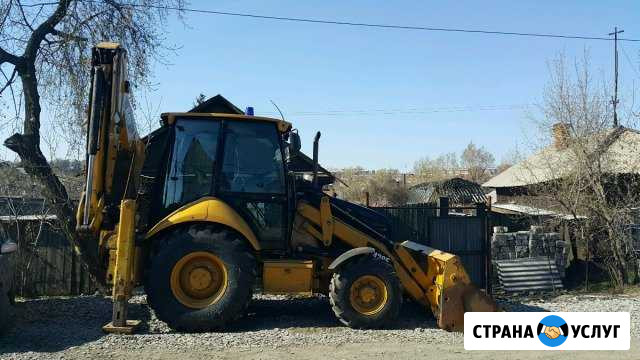Услуги экскаватора-погрузчика CAT428, гидромолот Иркутск - изображение 1