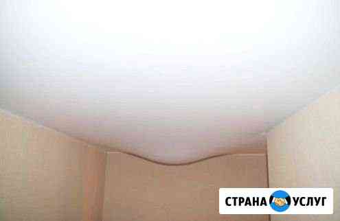 Слив воды в натяжном потолке Иркутск