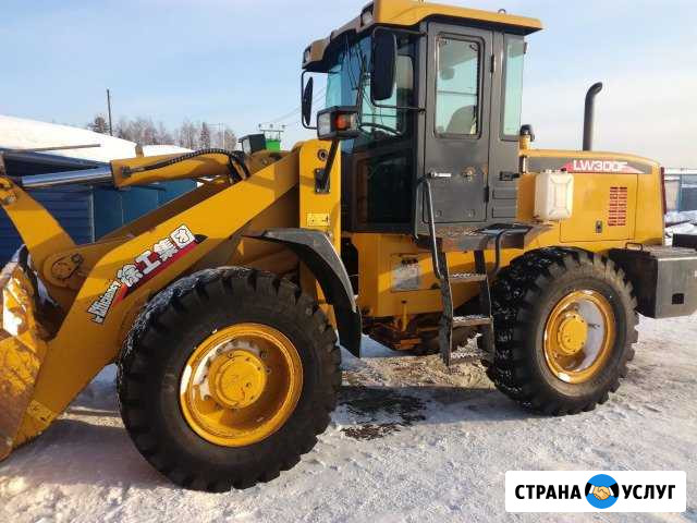 Услуги фронтального погрузчика в г.Тара Тара - изображение 1