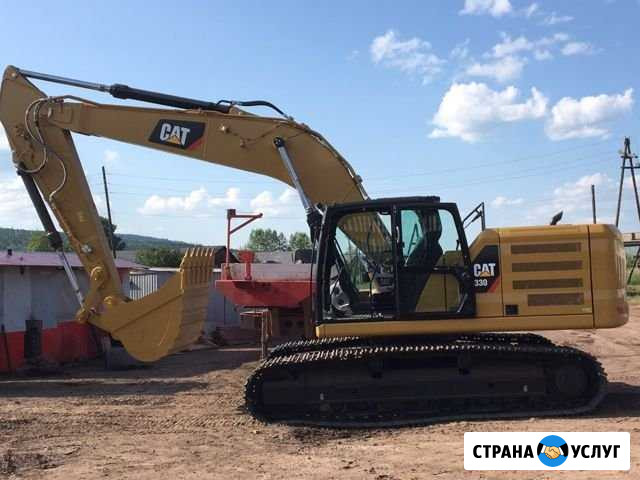 Услуги экскаватора,Тралла,Полуприцепов,манипулятор Усть-Кут - изображение 1
