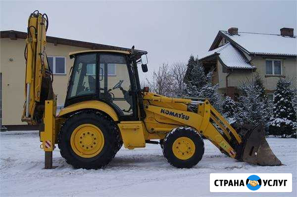 Услуги экскаватора-погрузчика Ярославль - изображение 1