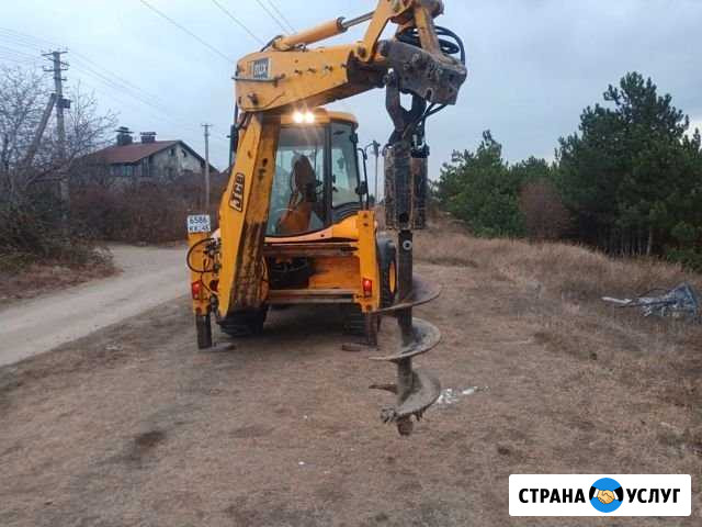 Аренда, услуги ямобура эксковатора погрузчика JCB Симферополь - изображение 1