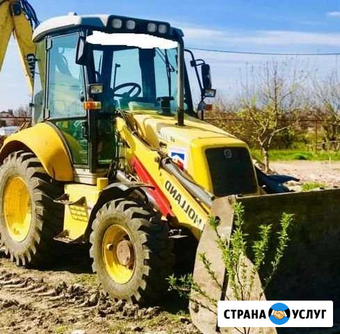 Аренда экскаватор-погрузчика Сургут - изображение 1