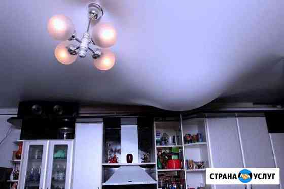 Слив воды и ремонт натяжного потолка Сургут