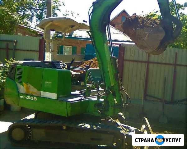 Услуги мини-экскаватора Mitsubishi MM330 Ростов-на-Дону - изображение 1
