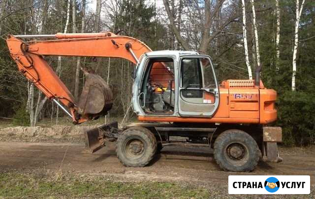 Аренда экскаватора колёсного Hitachi EX 165W Москва - изображение 1
