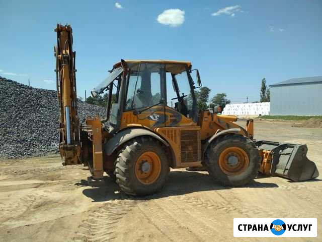 Аренда экскаватора погрузчика Азов - изображение 1
