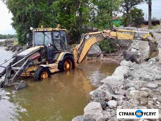 Экскаватор погрузчик в аренду Выборг