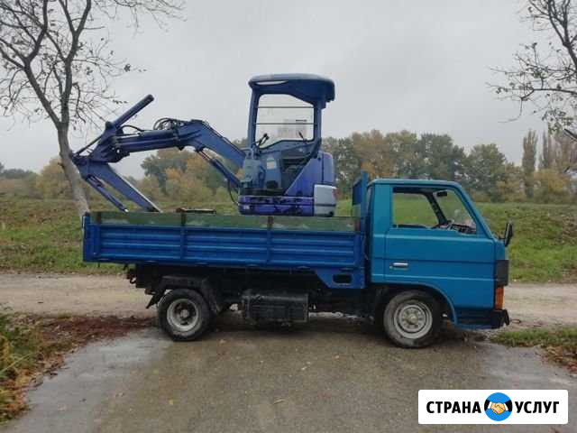 Услуги миниэкскаватора, самосвала. Работаю через и Славянск-на-Кубани - изображение 1