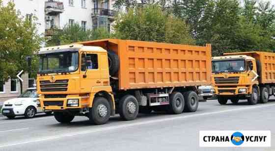 Аренда спецтехники Caterpillar 432f2 и Самосвалов Москва