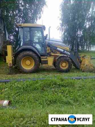 Услуги экскаватора-погрузчика John deere 325k Ижевск