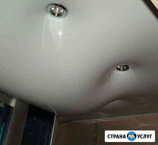 Слив воды с натяжного потолка, ремонт порезов Новосибирск