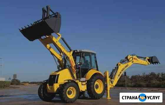 Услуги эксковатора-погрузчика. Аренда трактора Тверь