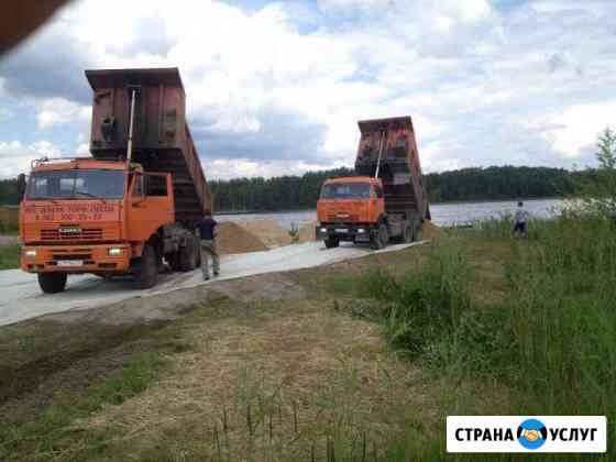 Услуги самосвала Камаз и экскаватора-погрузчика Выборг