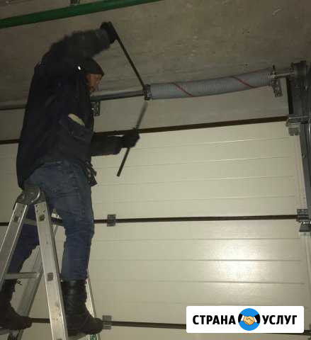Замена пружин на секционных воротах Санкт-Петербург - изображение 1