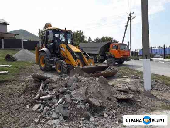 Экскаватор погрузчик с гидромолотом Новороссийск